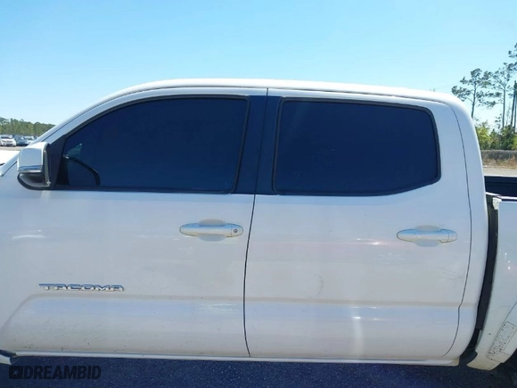 2019 Toyota Tacoma 4WD SR with VIN 3TMCZ5AN6KM229597, listed as a IAAI auction lot 41828835 with 134,907 mi miles. Bid and sale history available at carsss.com. Image 13.