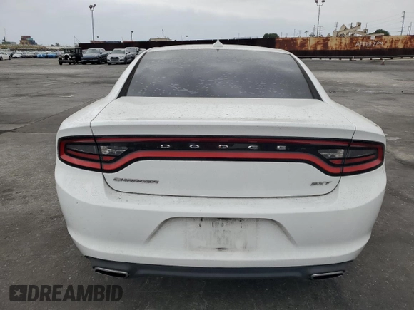 2015 Dodge Charger SXT z VIN 2C3CDXHG7FH721601, wystawiony jako Copart lot #58253925 z przebiegiem 123 004 mil mil oraz Szkoda całkowita • Salvage title. Historia ofert i sprzedaży dostępna na DreamBid. Obrazek 6.