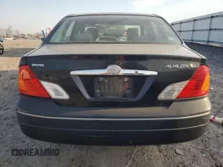 2001 Toyota Avalon XL z VIN 4T1BF28B61U175674, wystawiony jako Copart lot #49913765 z przebiegiem 170 245 mil mil oraz Tytuł czysty. Historia ofert i sprzedaży dostępna na DreamBid. Obrazek 6.