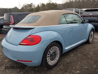 2015 Volkswagen Beetle 1.8T w/Tech with VIN 3VW517AT9FM802294, listed as a IAAI auction lot 41516005 with 110,184 mi miles and . Bid and sale history available at DreamBid. Image 4.