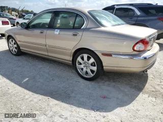 2004 Jaguar X-Type with VIN SAJEA51C34WE03194, listed as a Copart auction lot 78980144 with 51,164 mi miles and Clean Title. Bid and sale history available at carsss.com. Image 2.