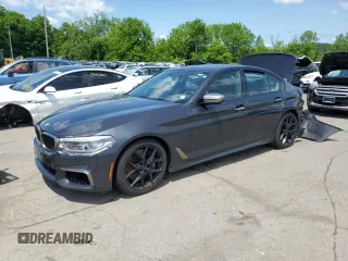 2018 BMW 5 Series M550i xDrive z VIN WBAJB9C57JG464452, wystawiony jako Copart lot #58919875 z przebiegiem Nie podano mil oraz Szkoda całkowita • Salvage title. Historia ofert i sprzedaży dostępna na DreamBid. Obrazek 1.