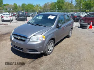 2011 Chevrolet Aveo 1LT with VIN KL1TD5DE2BB166314, listed as a IAAI auction lot 42189240 with 140,922 mi miles and . Bid and sale history available at DreamBid. Image 2.