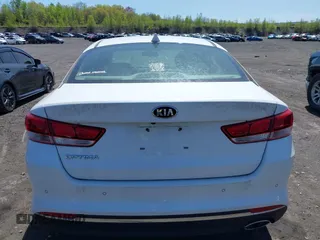 2018 Kia Optima LX with VIN 5XXGT4L31JG261091, listed as a IAAI auction lot 42168652 with 68,070 mi miles. Bid and sale history available at carsss.com. Image 16.