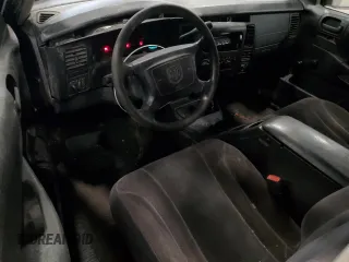 2003 Dodge Dakota z VIN 1D7GG16X23S204317, wystawiony jako Copart lot #54830745 z przebiegiem 139 508 mil mil oraz Szkoda całkowita • Salvage title. Historia ofert i sprzedaży dostępna na DreamBid. Obrazek 8.