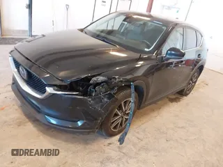 2018 Mazda CX-5 Touring with VIN JM3KFBCM9J0437490, listed as a IAAI auction lot 42006998 with 176,959 mi miles. Bid and sale history available at carsss.com. Image 17.