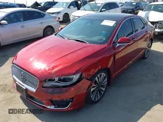 2019 Lincoln MKZ Hybrid Reserve II with VIN 3LN6L5MU7KR617325, listed as a IAAI auction lot 42584481 with 76,118 mi miles and . Bid and sale history available at DreamBid. Image 19.