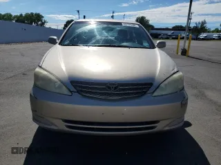 2004 Toyota Camry LE with VIN 4T1BE32K84U929163, listed as a Copart auction lot 65193485 with 245,734 mi miles and Clean title. Bid and sale history available at DreamBid. Image 5.