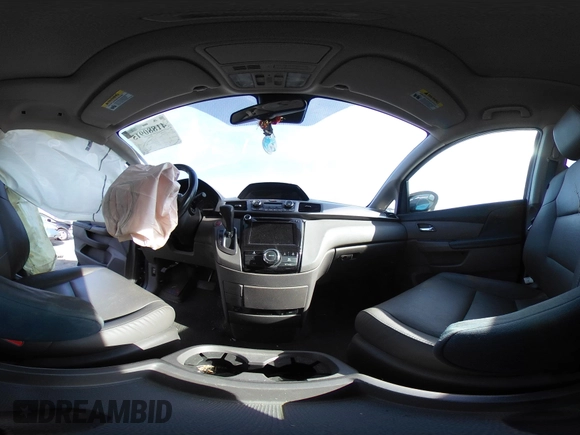 2015 Honda Odyssey EX-L with VIN 5FNRL5H65FB088106, listed as a IAAI auction lot 41880915 with 176,539 mi miles and . Bid and sale history available at carsss.com. Image 18.