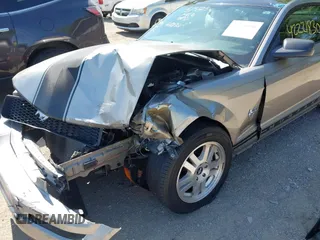 2009 Ford Mustang with VIN 1ZVHT80N295128872, listed as a IAAI auction lot 42221830 with 112,294 mi miles and . Bid and sale history available at DreamBid. Image 6.