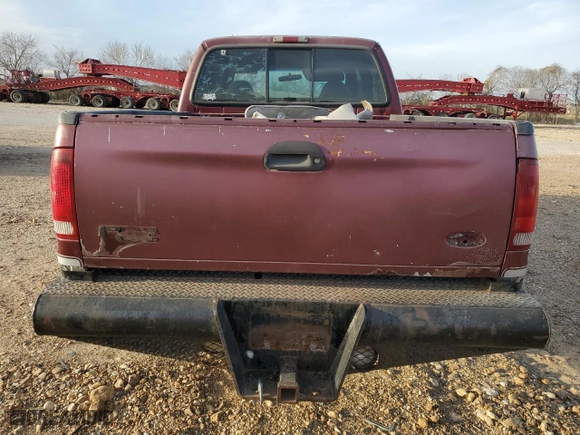 2000 Ford Super Duty F-250 XL with VIN 1FTNW21F7YEC96958, listed as a Copart auction lot 48067115 with 189,652 mi miles and Salvage Title. Bid and sale history available at carsss.com. Image 6.
