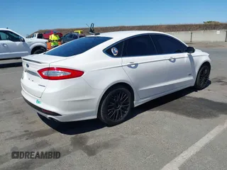 2016 Ford Fusion Titanium z VIN 3FA6P0SU2GR357508, wystawiony jako IAAI lot #42551834 z przebiegiem 177 425 mil mil oraz . Historia ofert i sprzedaży dostępna na DreamBid. Obrazek 4.
