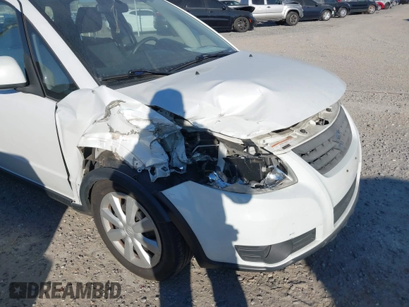 2013 Suzuki SX4 Crossover z VIN JS2YB5A39D6101193, wystawiony jako IAAI lot #41675796 z przebiegiem 87 459 mil mil oraz . Historia ofert i sprzedaży dostępna na DreamBid. Obrazek 6.
