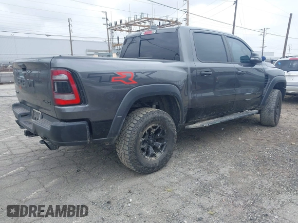 2022 Ram 1500 TRX with VIN 1C6SRFU98NN334983, listed as a IAAI auction lot 42010145 with 19,207 mi miles and . Bid and sale history available at DreamBid. Image 4.
