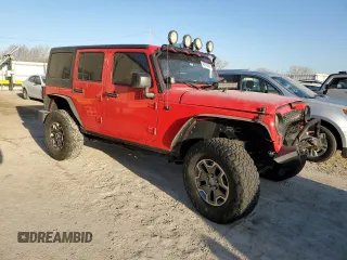 2016 Jeep Wrangler Unlimited Sport with VIN 1C4BJWDG2GL235220, listed as a Copart auction lot 48978005 with 126,863 mi miles and Salvage Title. Bid and sale history available at DreamBid. Image 4.