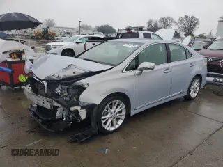 2010 Lexus HS 250h with VIN JTHBB1BAXA2003202, listed as a Copart auction lot 87448764 with 60,974 mi miles and Salvage Title. Bid and sale history available at DreamBid. Image 1.