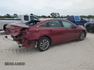 2022 Toyota Avalon XLE z VIN 4T1JZ1FB9NU076675, wystawiony jako Copart lot #88923135 z przebiegiem 41 768 mil mil oraz Nie do naprawy • Non repairable. Historia ofert i sprzedaży dostępna na DreamBid. Obrazek 3.