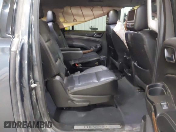 2019 Chevrolet Suburban Premier with VIN 1GNSKJKJ8KR169252, listed as a IAAI auction lot 41472231 with 95,266 mi miles and . Bid and sale history available at DreamBid. Image 8.