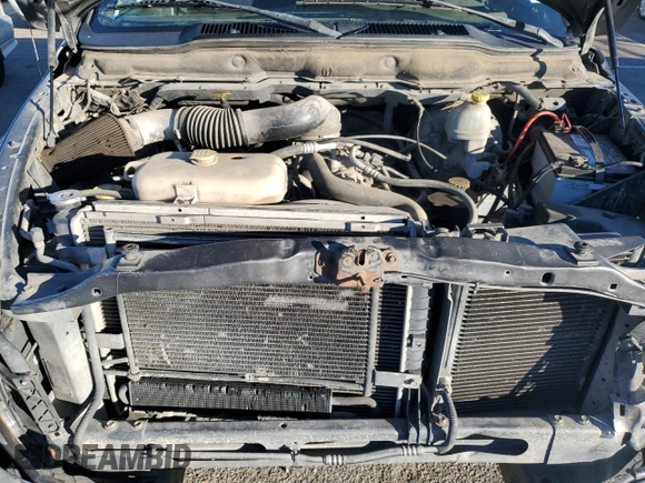 2003 Dodge 1500 ST z VIN 1D7HA18Z23J535974, wystawiony jako Copart lot #79688544 z przebiegiem 185 238 mil mil oraz Szkoda całkowita • Salvage title. Historia ofert i sprzedaży dostępna na DreamBid. Obrazek 11.