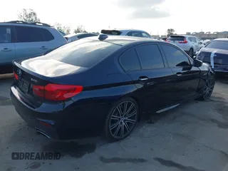 2017 BMW 5 Series 540i with VIN WBAJE5C38HG915154, listed as a IAAI auction lot 41572287 with 87,549 mi miles and . Bid and sale history available at carsss.com. Image 4.