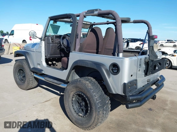 2002 Jeep Wrangler X with VIN 1J4FA39S42P763835, listed as a IAAI auction lot 42302645 with 233,634 mi miles and . Bid and sale history available at DreamBid. Image 3.