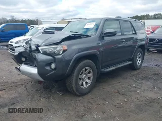 2014 Toyota 4Runner Limited with VIN JTEBU5JR4E5162629, listed as a IAAI auction lot 41265652 with 152,961 mi miles. Bid and sale history available at carsss.com. Image 2.