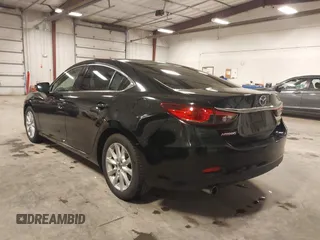 2016 Mazda 6 i Sport with VIN JM1GJ1U57G1433732, listed as a IAAI auction lot 41879844 with 107,269 mi miles and . Bid and sale history available at DreamBid. Image 3.