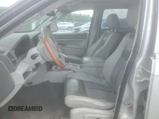 2007 Jeep Grand Cherokee Overland with VIN 1J8HR68227C579883, listed as a Copart auction lot 65282225 with 224,059 mi miles and Clean title. Bid and sale history available at DreamBid. Image 7.