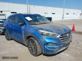 2017 Hyundai Tucson Value with VIN KM8J33A2XHU467861, listed as a IAAI auction lot 41684522 with 96,841 mi miles. Bid and sale history available at carsss.com. Image 1.