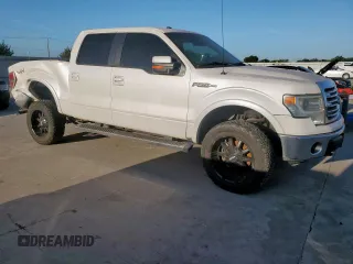 2014 Ford F-150 XL with VIN 1FTFW1EF0EKF18679, listed as a Copart auction lot 60872435 with 128,203 mi miles and Salvage title. Bid and sale history available at DreamBid. Image 4.