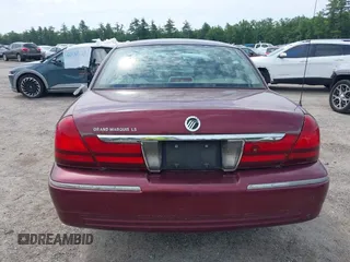 2005 Mercury Grand Marquis LS Premium z VIN 2MEHM75W05X636003, wystawiony jako IAAI lot #42480277 z przebiegiem 224 789 mil mil oraz . Historia ofert i sprzedaży dostępna na DreamBid. Obrazek 17.