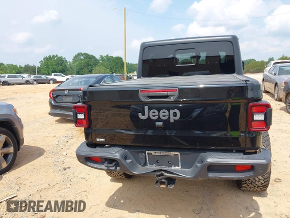 2021 Jeep Gladiator Willys with VIN 1C6HJTAG7ML514114, listed as a IAAI auction lot 42399793 with 78,829 mi miles and . Bid and sale history available at DreamBid. Image 16.
