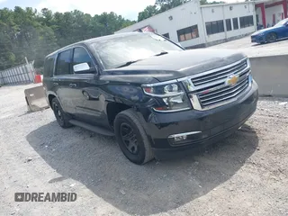 2015 Chevrolet Tahoe LTZ with VIN 1GNSKCKC0FR237580, listed as a IAAI auction lot 42700068 with 162,062 mi miles and . Bid and sale history available at DreamBid. Image 1.