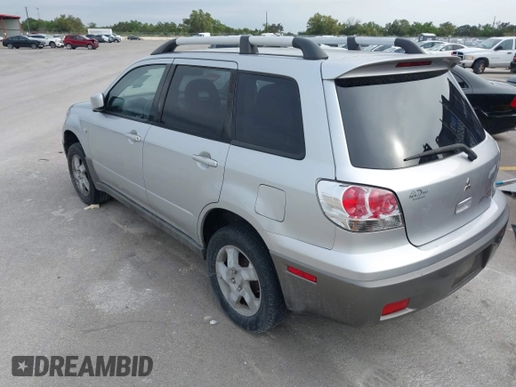 2003 Mitsubishi Outlander XLS with VIN JA4LZ41G53U107011, listed as a IAAI auction lot 41799550 with 164,519 mi miles. Bid and sale history available at carsss.com. Image 3.