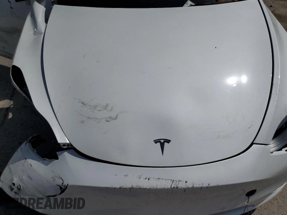 2022 Tesla Model Y Long Range z VIN 7SAYGAEE8NF378457, wystawiony jako Copart lot #56696905 z przebiegiem Nie podano mil oraz Czysty tytuł • Clean title. Historia ofert i sprzedaży dostępna na DreamBid. Obrazek 11.