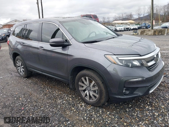 2022 Honda Pilot EX-L with VIN 5FNYF6H57NB038144, listed as a IAAI auction lot 41066857 with 24,551 mi miles. Bid and sale history available at carsss.com. Image 1.
