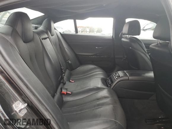 2015 BMW 6 Series 640i xDrive z VIN WBA6B8C58FD453291, wystawiony jako Copart lot #45531765 z przebiegiem 93 666 mil mil oraz Szkoda całkowita • Salvage title. Historia ofert i sprzedaży dostępna na DreamBid. Obrazek 10.