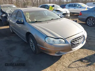 2000 Chrysler LHS with VIN 2C3HC56G4YH222936, listed as a IAAI auction lot 41453912 with 202,102 mi miles. Bid and sale history available at carsss.com. Image 1.
