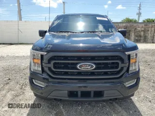 2022 Ford F-150 XL with VIN 1FTFW1E82NFC33590, listed as a Copart auction lot 61806045 with 53,477 mi miles and Salvage title. Bid and sale history available at DreamBid. Image 5.