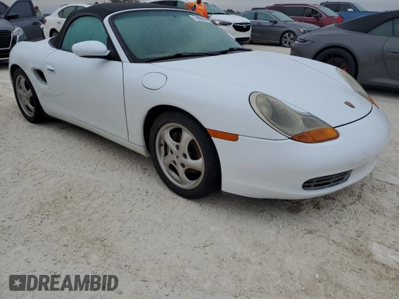 1998 Porsche Boxster с VIN WP0CA2987WU623387, выставлен на аукционе Copart как лот 76859594 с пробегом Не указан миль и Списание • Salvage title. История ставок и продаж доступна на DreamBid. Изображение 4.