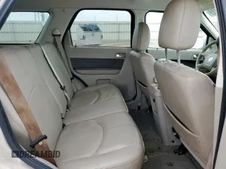 2010 Mercury Mariner Premier с VIN 4M2CN8HG7AKJ29917, выставлен на аукционе Copart как лот 63306425 с пробегом 288 075 миль миль и Списание • Salvage title. История ставок и продаж доступна на DreamBid. Изображение 11.