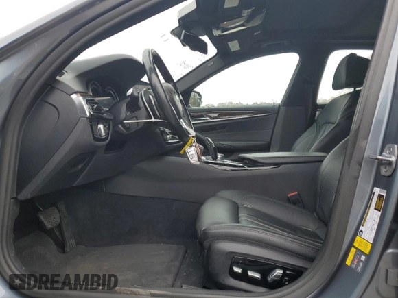 2019 BMW 5 Series 530e xDrive with VIN WBAJB1C56KB375312, listed as a Copart auction lot 52709125 with 63,422 mi miles and Salvage title. Bid and sale history available at DreamBid. Image 7.