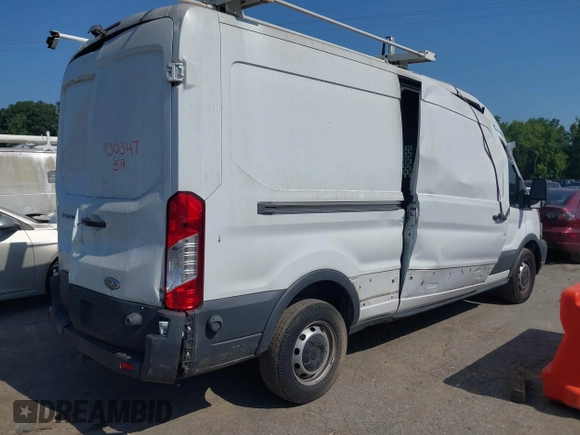 2015 Ford Transit Cargo z VIN 1FTNR2CM8FKA48994, wystawiony jako IAAI lot #42530112 z przebiegiem 207 506 mil mil oraz . Historia ofert i sprzedaży dostępna na DreamBid. Obrazek 6.