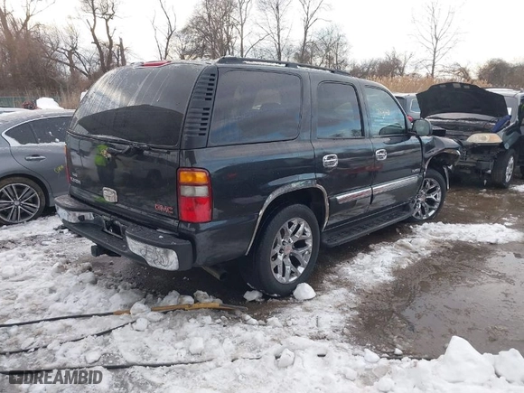 2003 GMC Yukon SLT with VIN 1GKEC13Z63R166721, listed as a IAAI auction lot 41266638 with 246,888 mi miles. Bid and sale history available at carsss.com. Image 4.