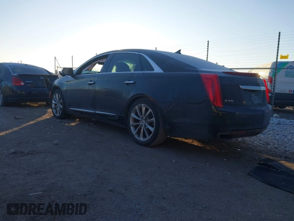 2014 Cadillac XTS Luxury with VIN 2G61M5S32E9289279, listed as a IAAI auction lot 41279495 with 106,655 mi miles. Bid and sale history available at carsss.com. Image 3.