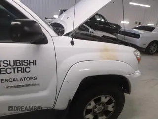 2013 Toyota Tacoma with VIN 3TMMU4FN6DM062201, listed as a IAAI auction lot 42906789 with 266,431 mi miles and . Bid and sale history available at DreamBid. Image 3.