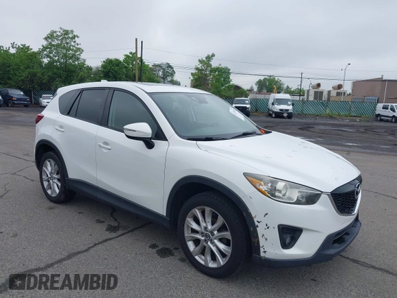 2015 Mazda CX-5 Grand Touring with VIN JM3KE4DY5F0530854, listed as a IAAI auction lot 42274582 with 144,732 mi miles and . Bid and sale history available at DreamBid. Image 6.