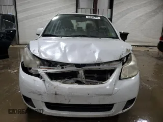 2011 Suzuki SX4 LE with VIN JS2YC5A29B6302397, listed as a Copart auction lot 82691304 with 251,382 mi miles and Salvage Title. Bid and sale history available at carsss.com. Image 5.