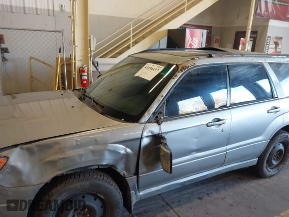 2007 Subaru Forester X w/Premium Pkg with VIN JF1SG65657H719525, listed as a IAAI auction lot 41696437 with 217,895 mi miles. Bid and sale history available at carsss.com. Image 6.