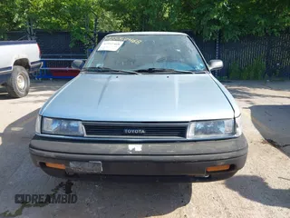 1990 Toyota Corolla z VIN JT2AE94A1L3367594, wystawiony jako IAAI lot #42557468 z przebiegiem 136 600 mil mil oraz . Historia ofert i sprzedaży dostępna na DreamBid. Obrazek 6.